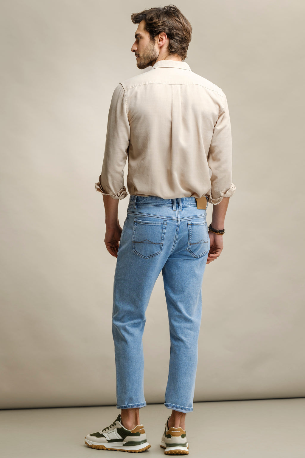 CALÇAS DENIM TAPERED FIT