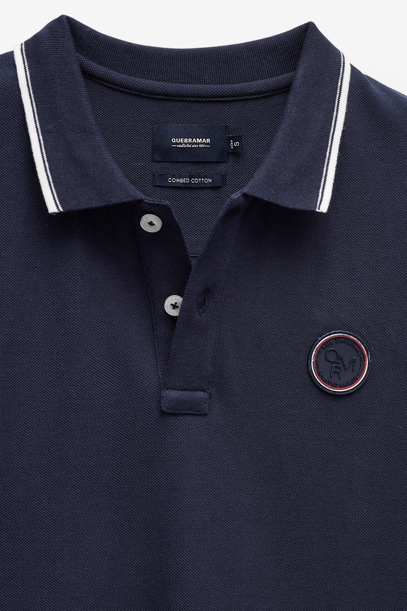 POLO PIQUÉ CON INSIGNIA
