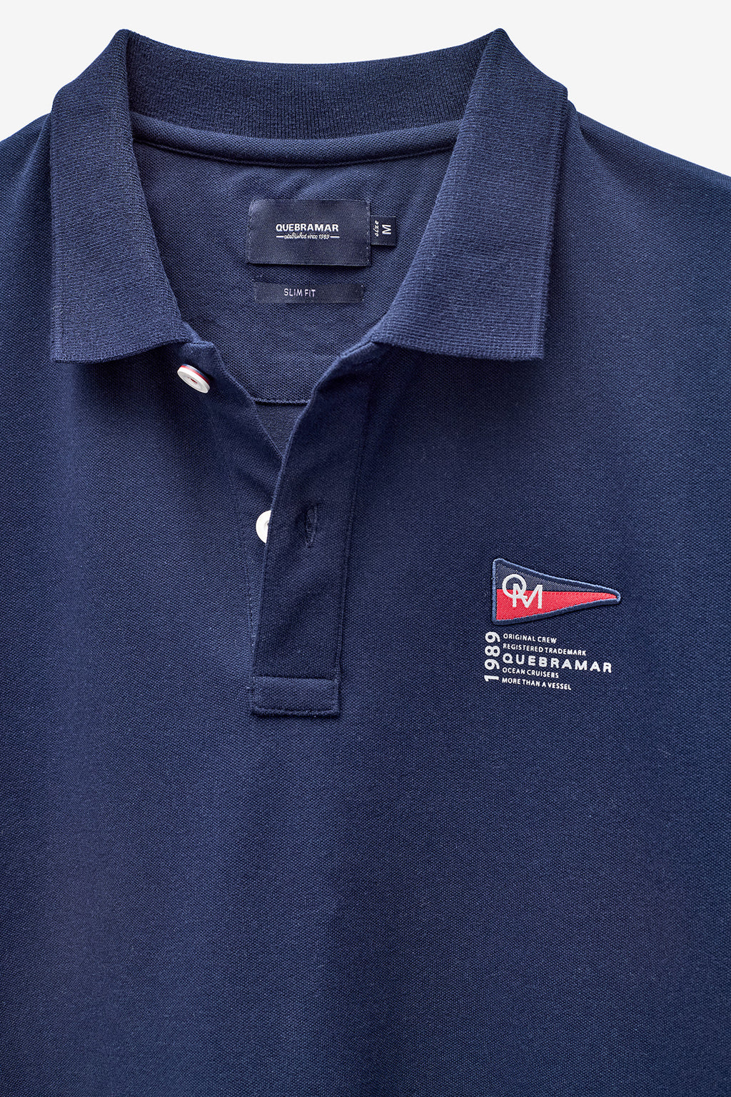 POLO PIQUÉ CON INSIGNIA