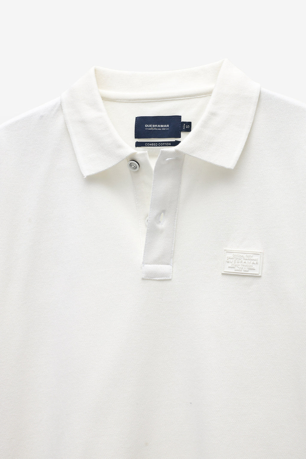 POLO PIQUÉ CON INSIGNIA