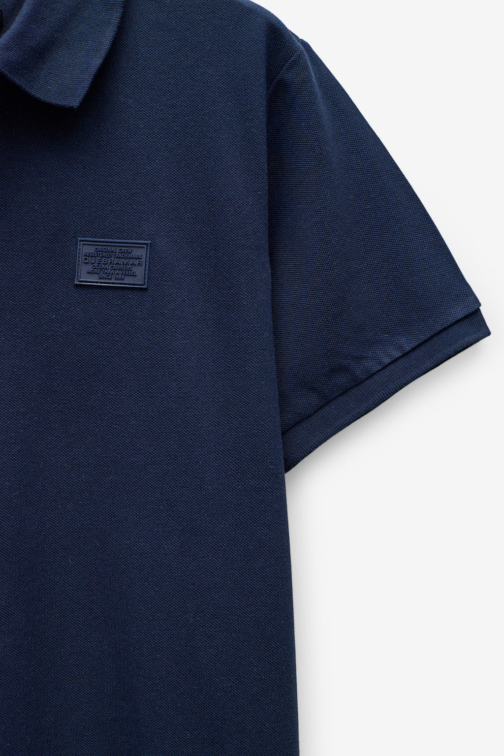 POLO PIQUET COM BADGE