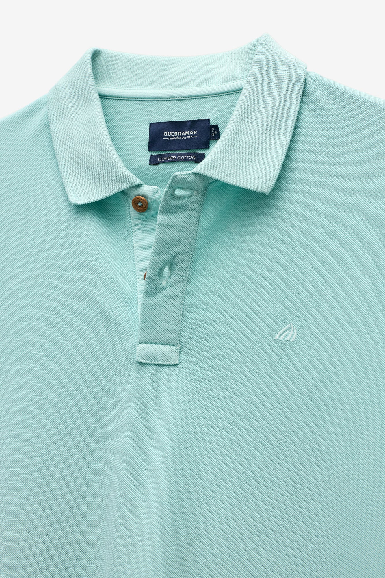 POLO PIQUET LISO COM BORDADO