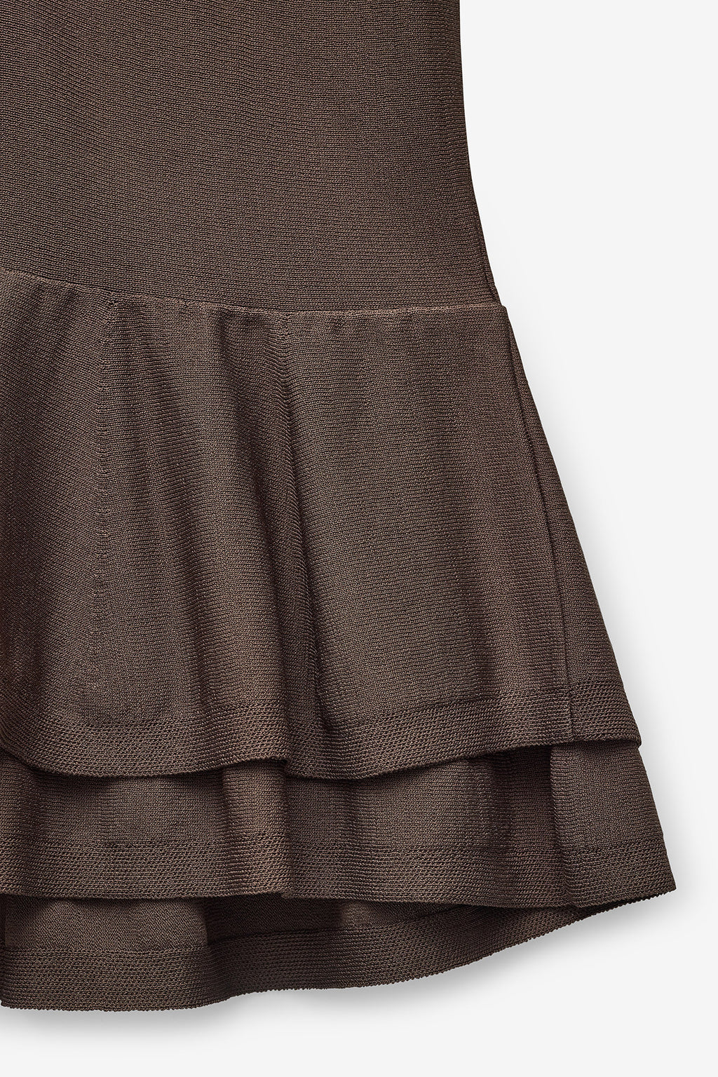 POLO DE PUNTO CON PEPLUM