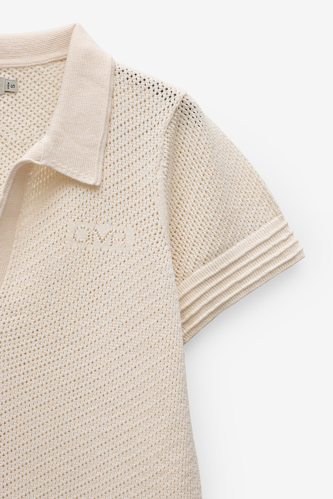 POLO EM MALHA COM TEXTURA