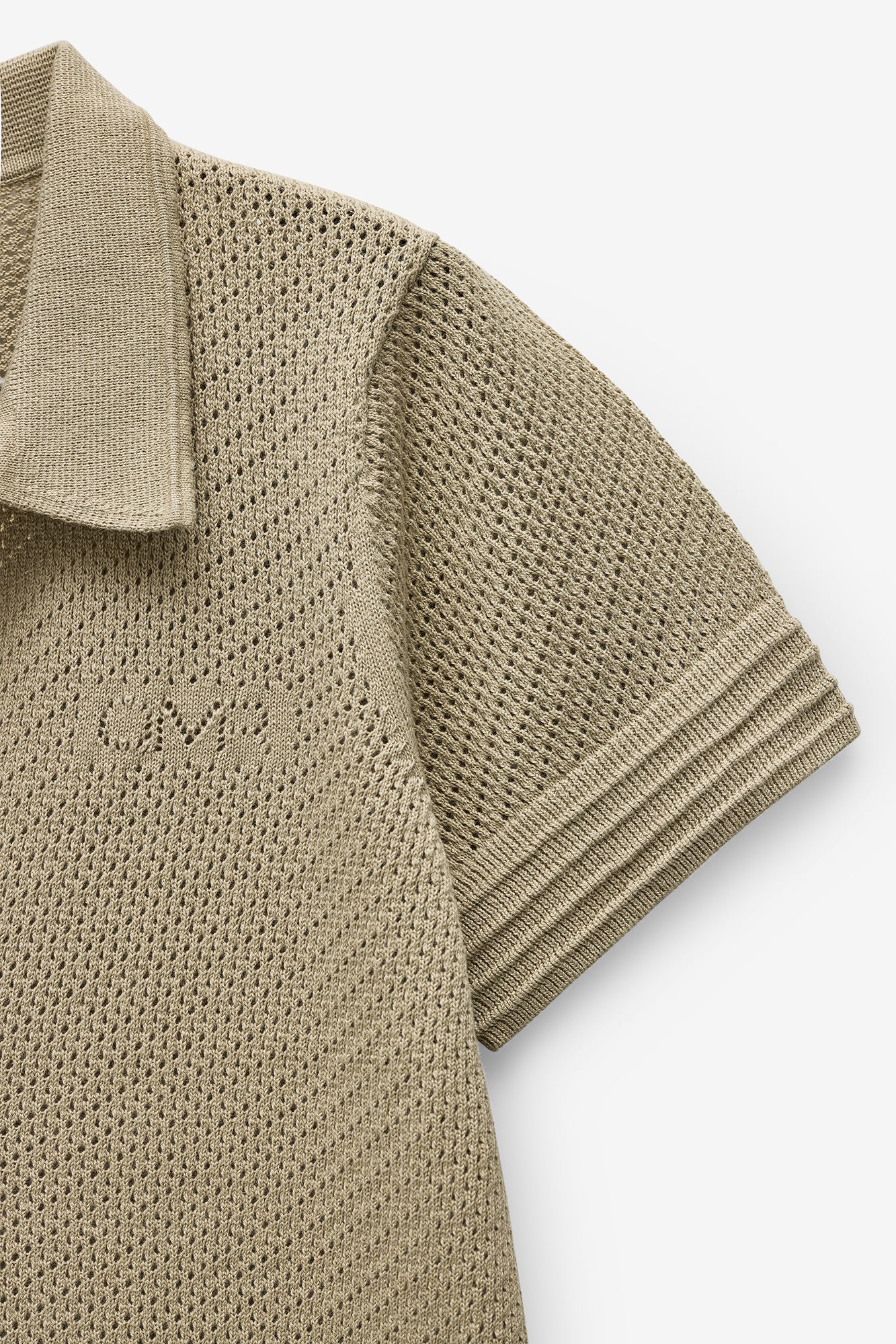 POLO EM MALHA COM TEXTURA