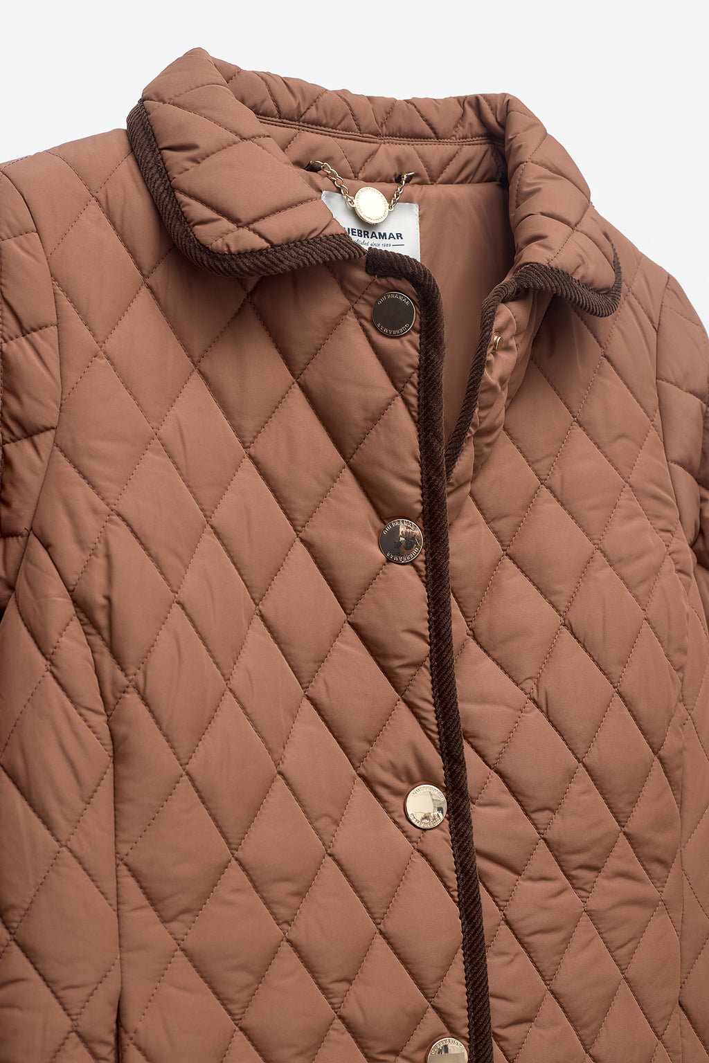 CHAQUETA CORTA CON ROMBOS