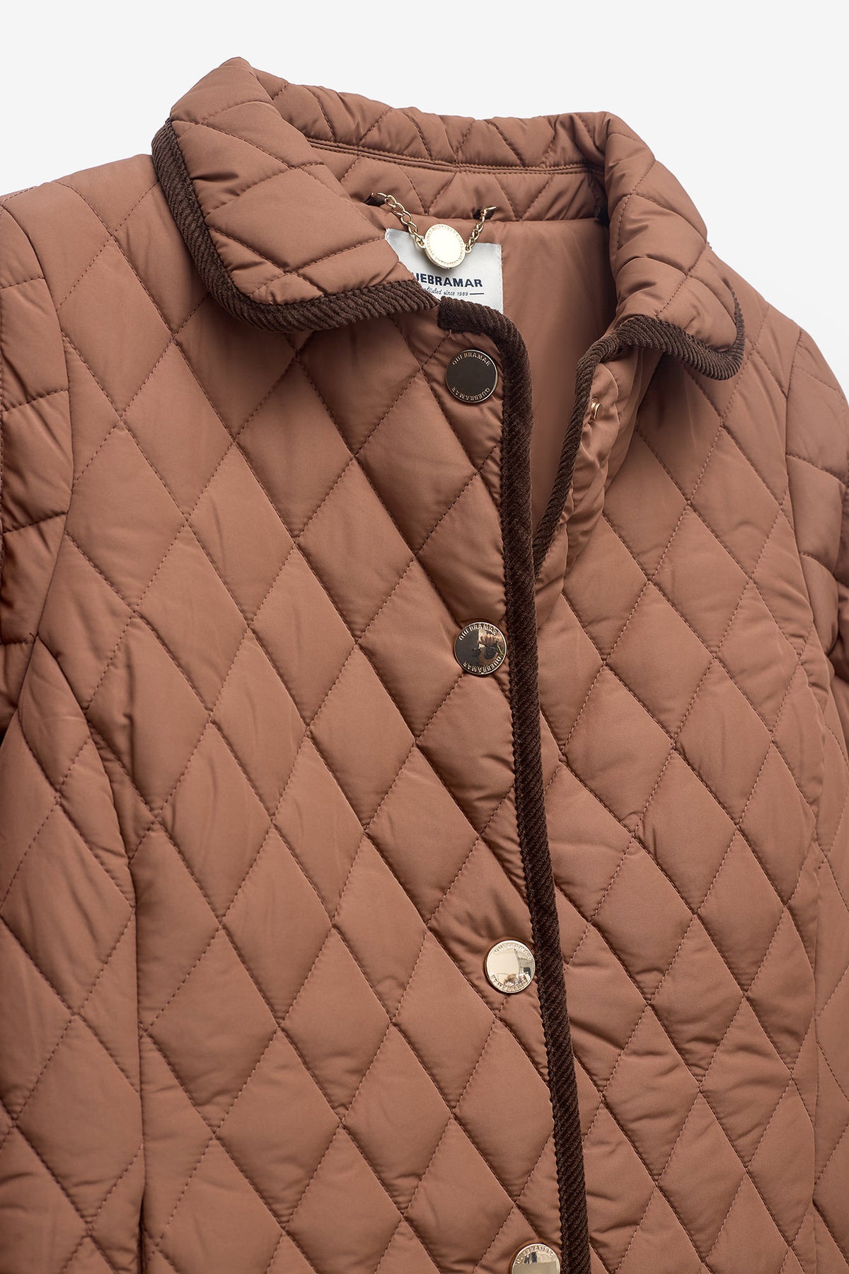 CHAQUETA CORTA CON ROMBOS