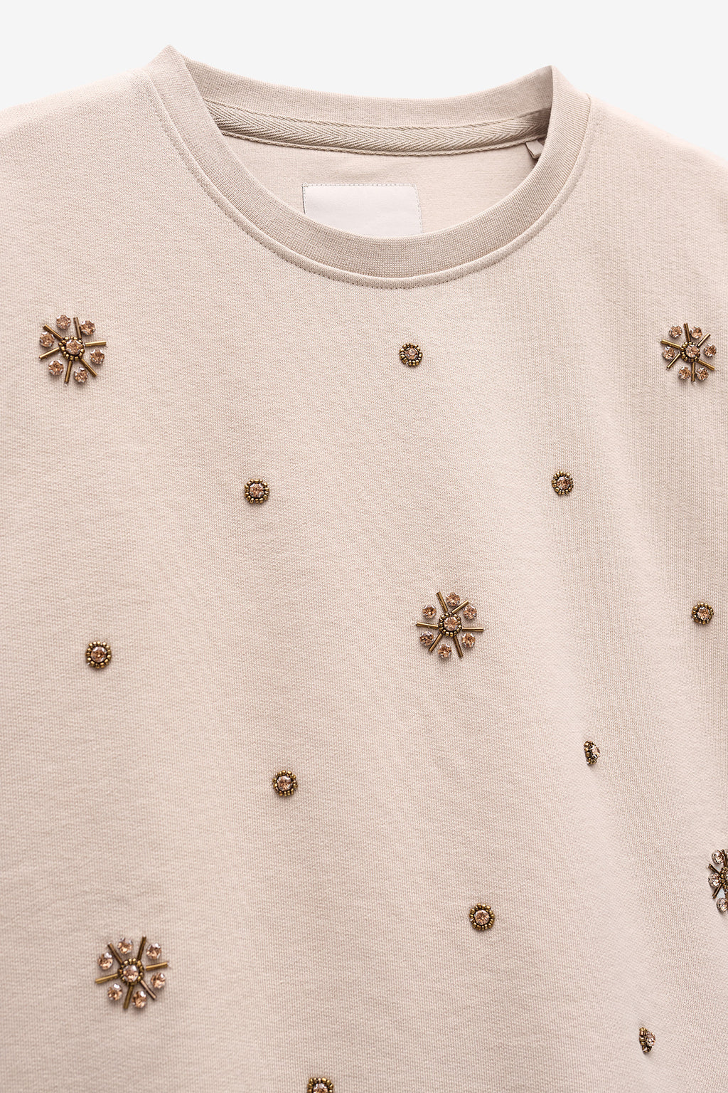 SWEATSHIRT COM APLICAÇÕES BRILHANTES